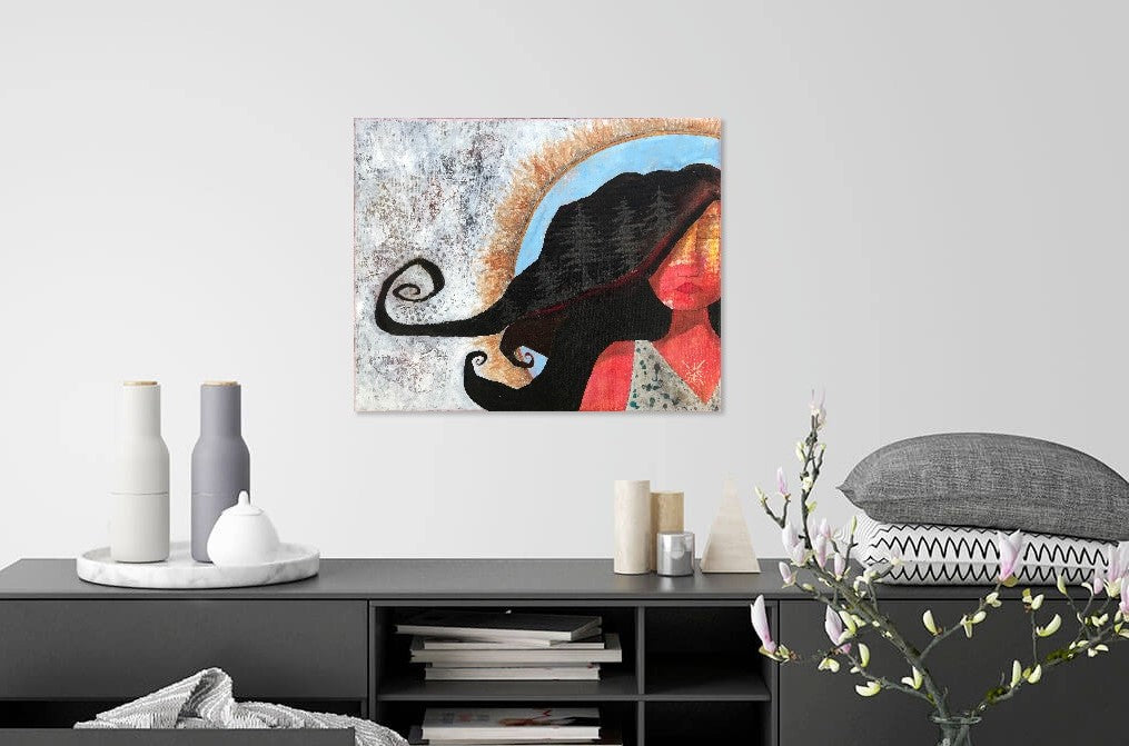 earth toned feminine artwork hanging in a gray and white bedroom setting