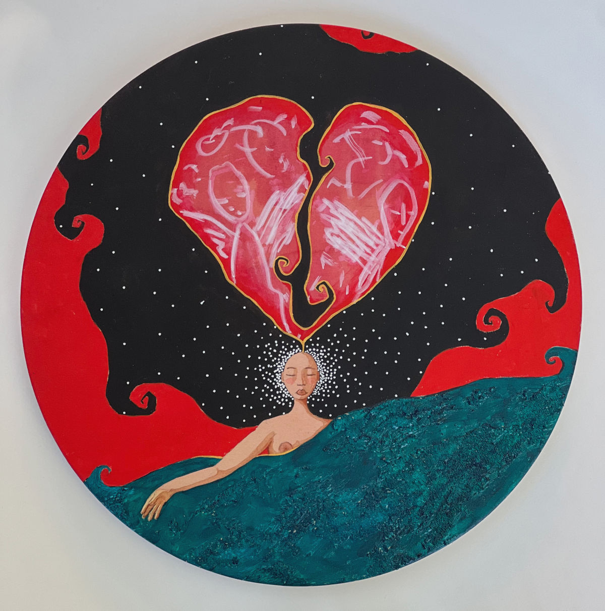 Round painting of a sleeping woman. Her right arm and part of her breast are uncovered; a teal blanket covers the rest of her.  Her black hair spills up and around and forms a heart shape.  The background is a vivid red. Inside the heart are white marks that look like angels or spirits.  White dots flow from around the woman's head, representing energy.